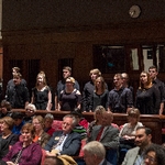 The student choir performs a song during the event